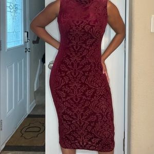 Gently loved. Embroidered wine color dress.